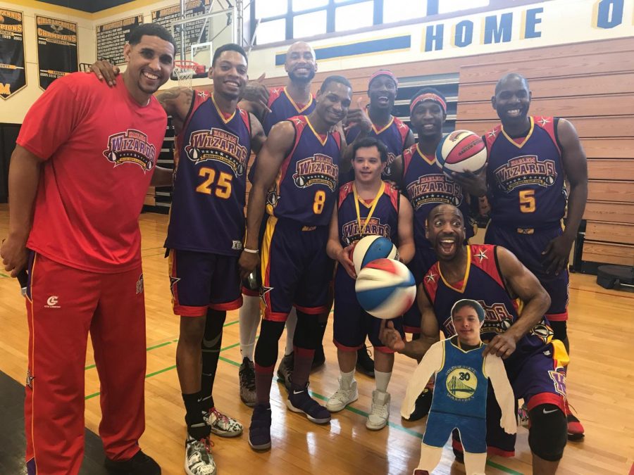 JoJo and the wizards pose for pics in the gym after the surprise basketball game